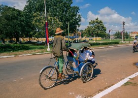 Riding Cyclo on road - សុីក្លូ